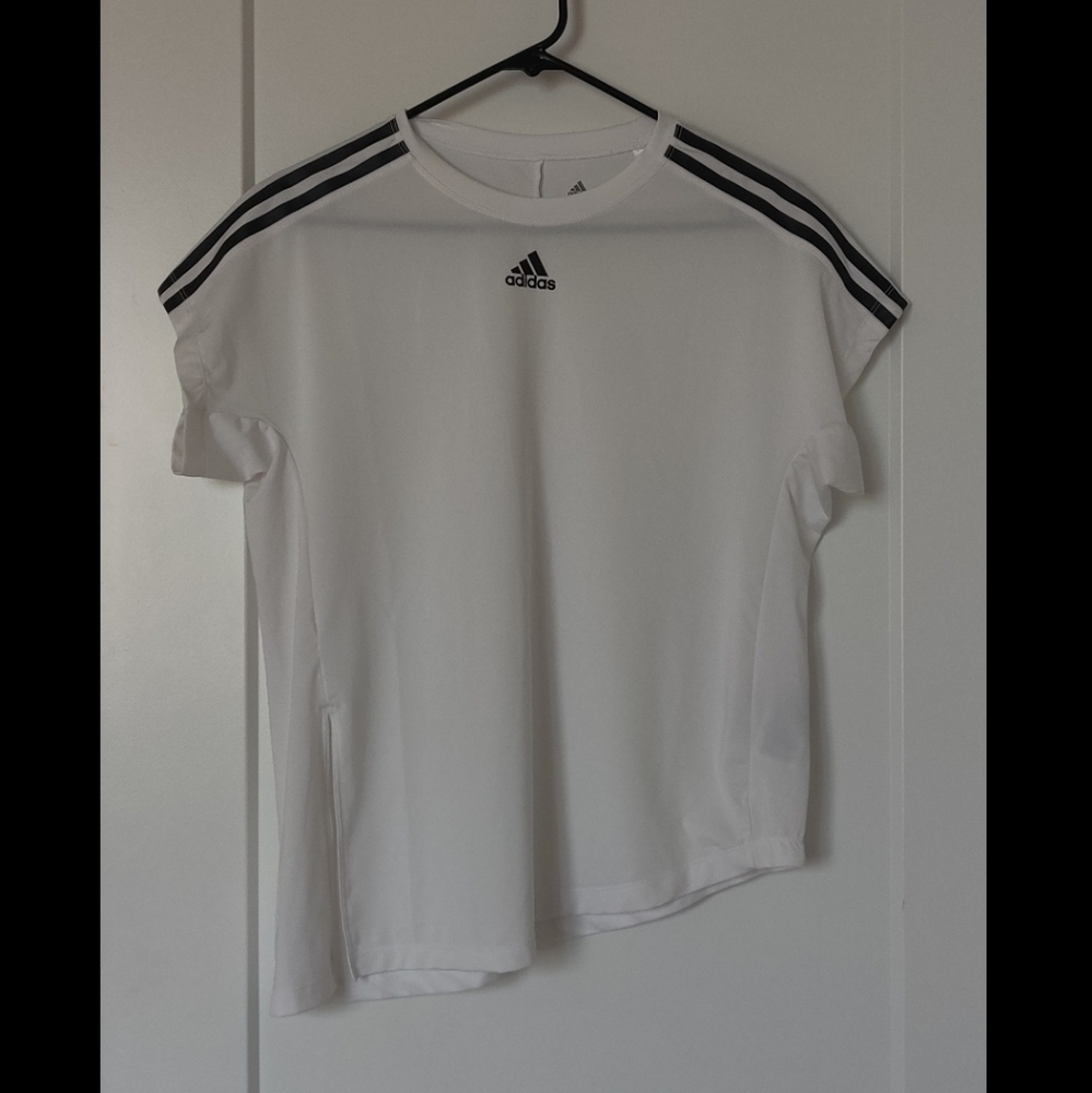 An adidas black and white short sleeve top